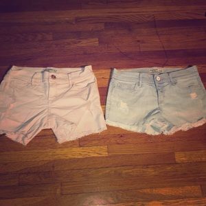 2 pairs of Abercrombie distressed girls shorts.
